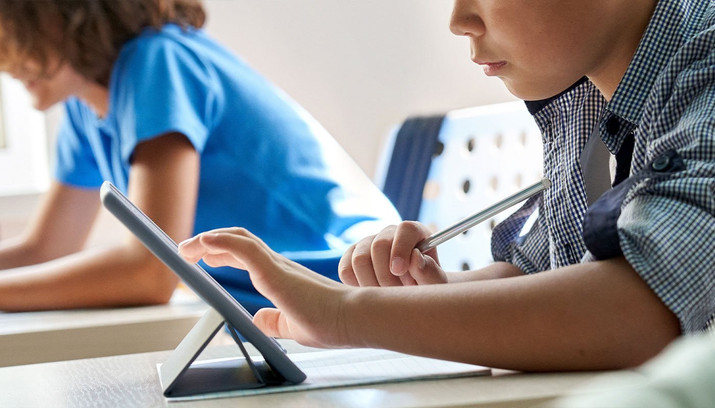 Closeup of students at desks in school